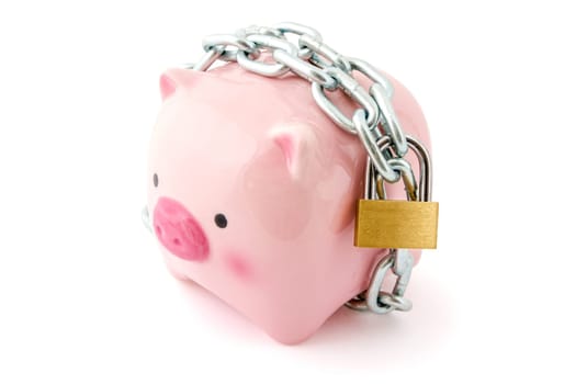 Piggybank chained up and locked. Concept for financial protection inferences or other investment messages.