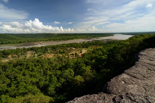 The landscape with views of the Mekong River from Pha Taem National Park at Khong Chiam near Ubon Ratchathani in northeastern Thailand in South East Asia.