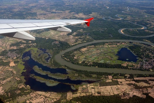 The landscape of an airplane over the surroundings of Ubon Ratchathani in the northeast of Thailand in South East Asia.