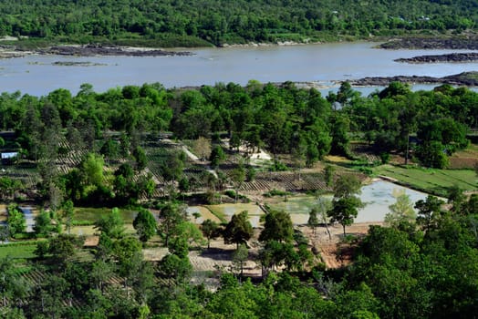 The landscape with views of the Mekong River from Pha Taem National Park at Khong Chiam near Ubon Ratchathani in northeastern Thailand in South East Asia.