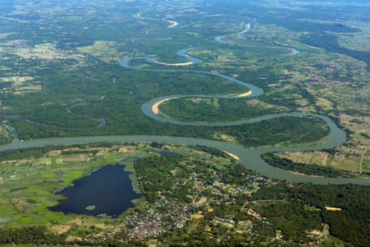 The landscape of an airplane over the surroundings of Ubon Ratchathani in the northeast of Thailand in South East Asia.