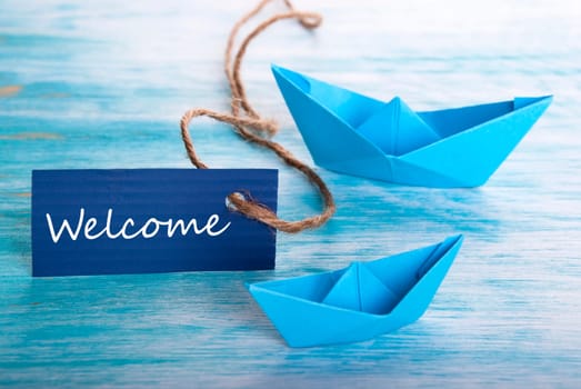 Label with Welcome and Boats, blue Nautical Background