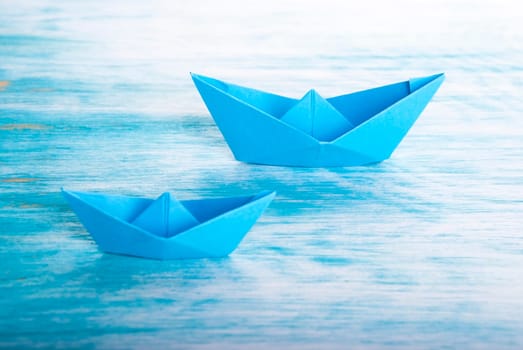 Two Origami Boats in the Sea