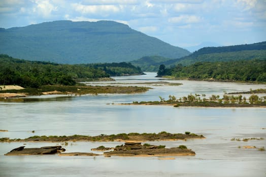 View from Wat Tham Khu Ha Sawan Temple in Khong Jiam on the Mekong River near Pha Taem National Park near Ubon Ratchathani in northeastern Thailand in South East Asia.