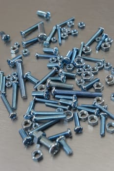Nuts and bolts isolated against a white background