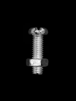 Nuts and bolts isolated against a white background