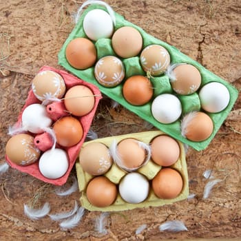 Rustic background with different eggs