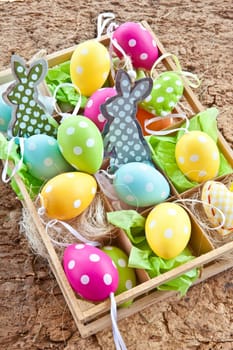 Colorful Easter decoration with dots in small box
