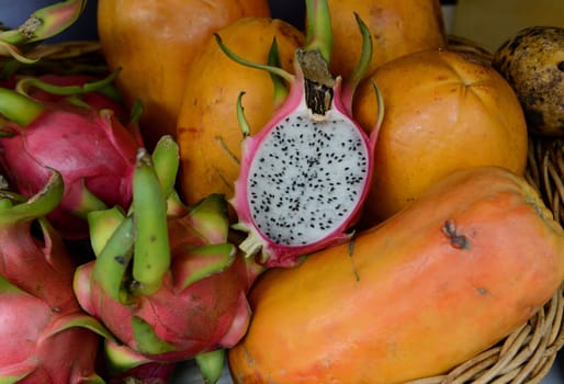 Breakfast with a dragon fruit at a market in Chiang Mai in northern Thailand in South East Asia.