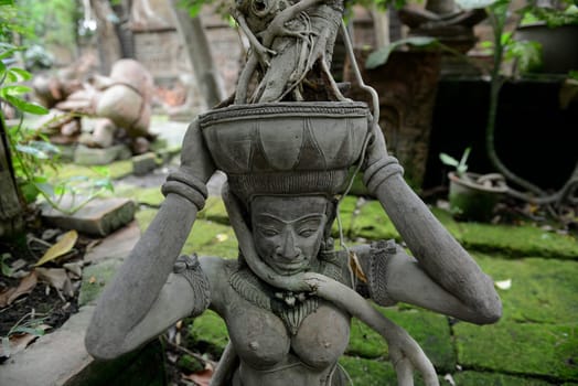 Traditional figures are available for sale in the garden of Ban Phor Linag Meun's Terracota Art at Terracota Garden in Chiang Mai in northern Thailand in South East Asia.