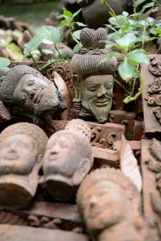 Traditional figures are available for sale in the garden of Ban Phor Linag Meun's Terracota Art at Terracota Garden in Chiang Mai in northern Thailand in South East Asia.