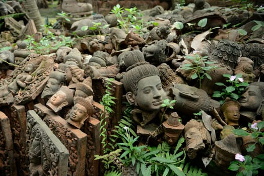 Traditional figures are available for sale in the garden of Ban Phor Linag Meun's Terracota Art at Terracota Garden in Chiang Mai in northern Thailand in South East Asia.