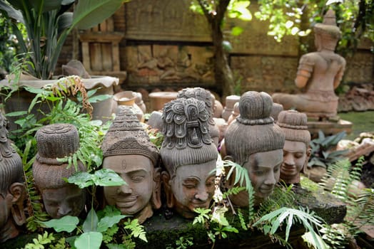 Traditional figures are available for sale in the garden of Ban Phor Linag Meun's Terracota Art at Terracota Garden in Chiang Mai in northern Thailand in South East Asia.
