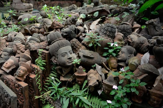 Traditional figures are available for sale in the garden of Ban Phor Linag Meun's Terracota Art at Terracota Garden in Chiang Mai in northern Thailand in South East Asia.