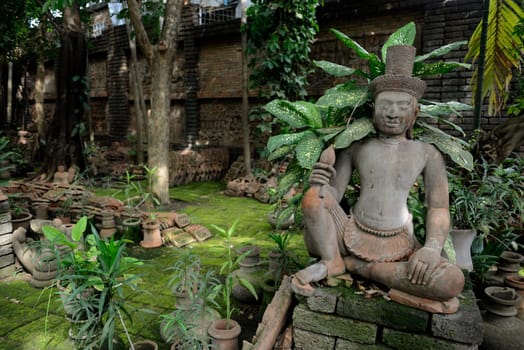 Traditional figures are available for sale in the garden of Ban Phor Linag Meun's Terracota Art at Terracota Garden in Chiang Mai in northern Thailand in South East Asia.