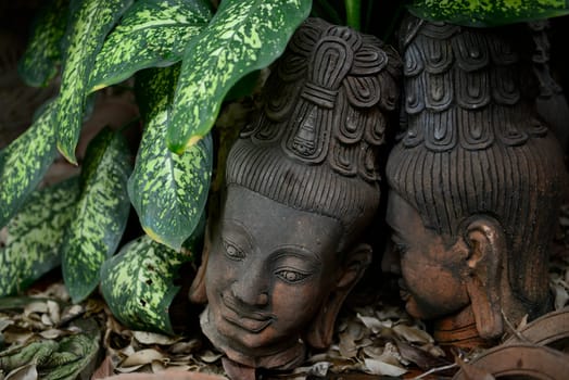 Traditional figures are available for sale in the garden of Ban Phor Linag Meun's Terracota Art at Terracota Garden in Chiang Mai in northern Thailand in South East Asia.