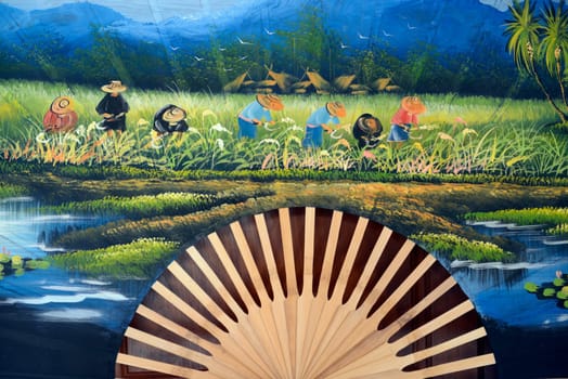 Traditionall umbrellas and faechers from Paier are produced in a paper screen factory in Chiang Mai in the north of Thailand in South East Asia.