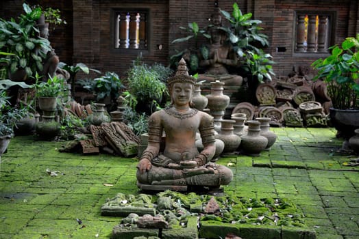 Traditional figures are available for sale in the garden of Ban Phor Linag Meun's Terracota Art at Terracota Garden in Chiang Mai in northern Thailand in South East Asia.