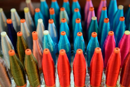 A silk factory in Chiang Mai in northern Thailand in South East Asia.