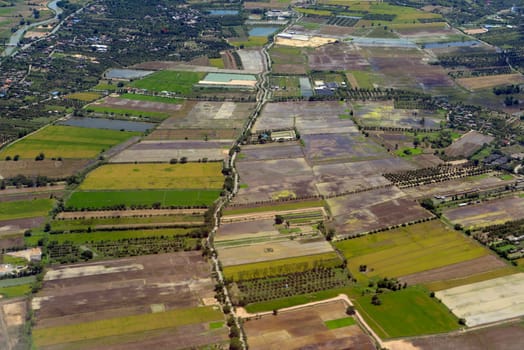 View from a plane on the flight over Chiang Mai in the north of Thailand in South East Asia.
