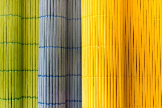 Tablecloths folders three different colors with a textured wooden branches