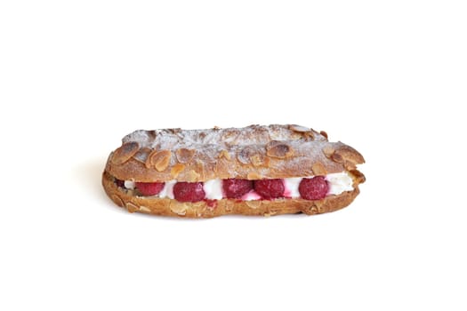 Details of a delicious pastry confectioned with raspberry and chantilly cream.