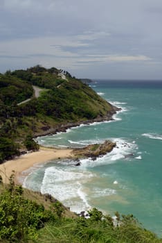 A beach in Hat Nai Harn in the south of phuket island in southern Thailand in South East Asia.