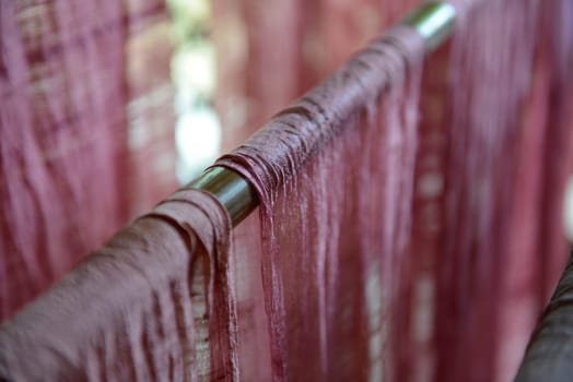 Silk fabric at a silk factory in Chiang Mai in northern Thailand in South East Asia.