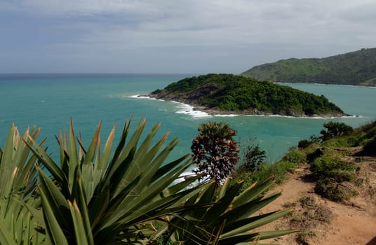 The cape Promthep viewpoint at Rawai Beach in the south of Phuket Island in the south of Thailand in South East Asia.