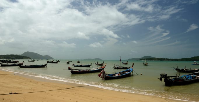 A beach in Rawai Beach in the south of Phuket Island in southern Thailand in South East Asia.