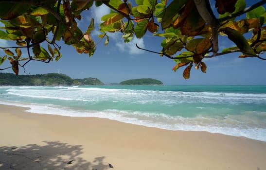 A beach in Hat Kata Yai in the south of Phuket Island in southern Thailand in South East Asia.