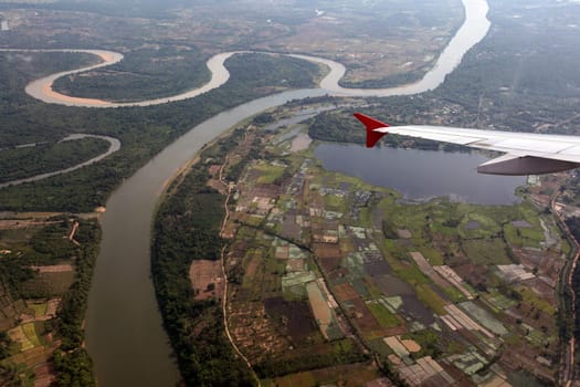 The landscape around The province of Ubon Rachathani in isan on the approach from Chiang mai to Ubon in northeastern Thailand.