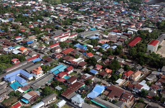 The view of the city of Ubon Rachathani in the Isan on the approach from Chiang mai to Ubon in northeastern Thailand.