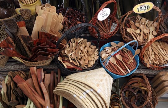 Wooden souveniere at the market of Amnat Charoen in the province of Amnat Charoen in the Isan in northeastern Thailand.