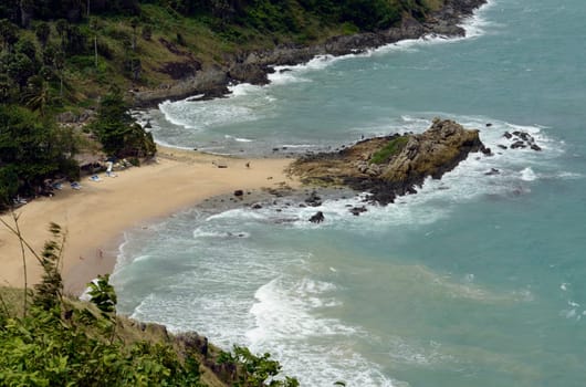 A beach in Hat Nai Harn in the south of phuket island in southern Thailand in South East Asia.