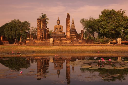 The Wat Mahathat Temple in the temple complex of Alt-Sukhothai in the province of Sukhothai in the north of Thailand in South East Asia.