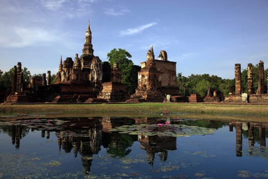 The Wat Mahathat Temple in the temple complex of Alt-Sukhothai in the province of Sukhothai in the north of Thailand in South East Asia.