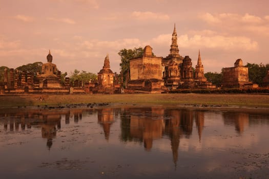 The Wat Mahathat Temple in the temple complex of Alt-Sukhothai in the province of Sukhothai in the north of Thailand in South East Asia.