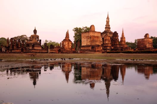 The Wat Mahathat Temple in the temple complex of Alt-Sukhothai in the province of Sukhothai in the north of Thailand in South East Asia.