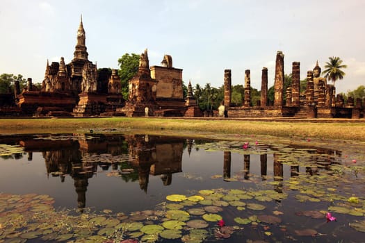 The Wat Mahathat Temple in the temple complex of Alt-Sukhothai in the province of Sukhothai in the north of Thailand in South East Asia.