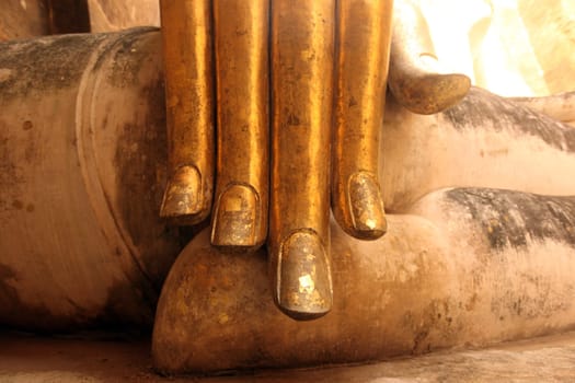 The Buddha figure in the Wat Si Chum temple in the temple complex of Alt-Sukhothai in the province of Sukhothai in northern Thailand in South East Asia.