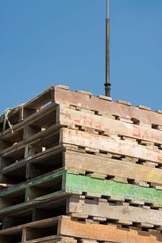 Construction wooden pallets transported on a flatbed truck load