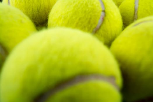 Approaching tennis balls set. You can see the texture of the fibers and fluoresce