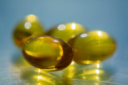 Macro To A Yellow Pills With Blue Background