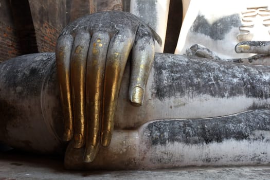 The Buddha figure in the Wat Si Chum temple in the temple complex of Alt-Sukhothai in the province of Sukhothai in northern Thailand in South East Asia.