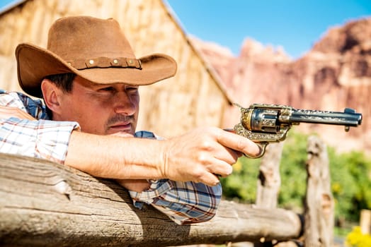 SOUTH WEST - A cowboy takes time to rest and reflect.