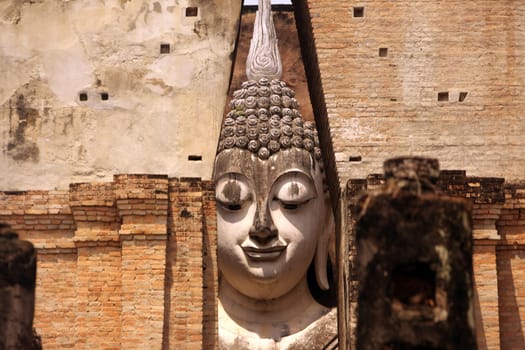 The Buddha figure in the Wat Si Chum temple in the temple complex of Alt-Sukhothai in the province of Sukhothai in northern Thailand in South East Asia.