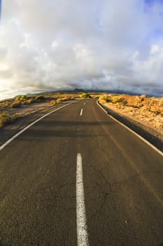 Long Empty Desert Road on a Cludy Day