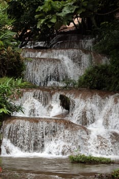 Die Landschaft mit einem Wasserfall beim Dorf Fang noerdlich von Chiang Mai im Norden von Thailand.