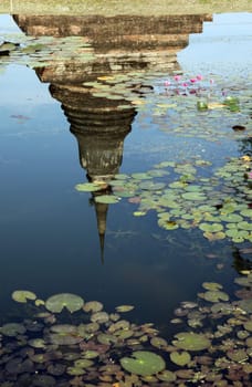 A chedi at the Wat Mahathat Temple in the temple complex of Alt-Sukhothai in Sukhothai province in northern Thailand in South East Asia.